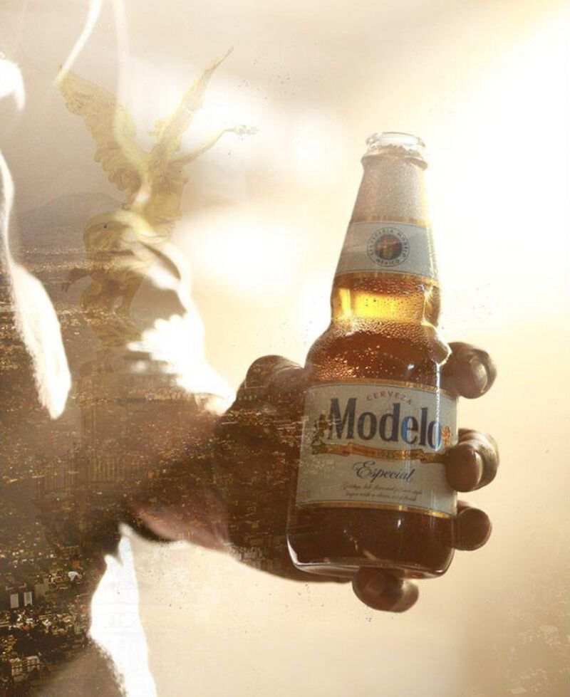 Bottle of Modelo Especial being held