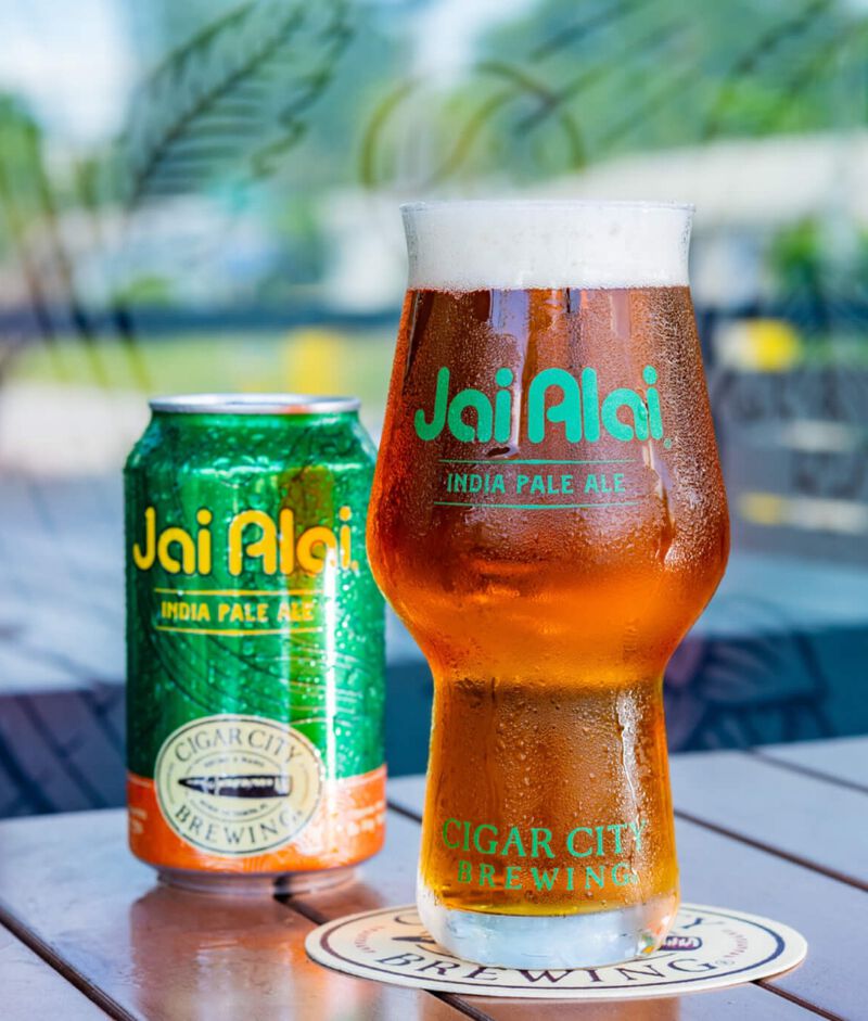 A can of Jai Alai beer with a glass