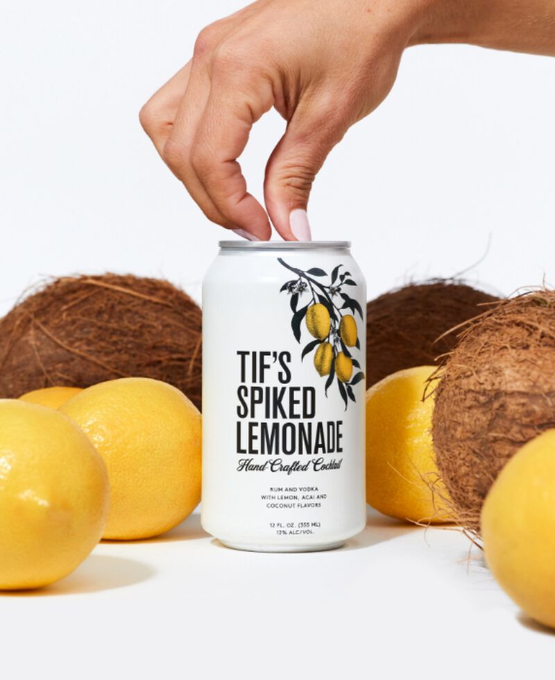 Can of Tif's Spiked Lemonade with coconuts and lemons