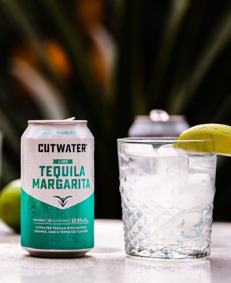 Cutwater Lime Margarita Can with cocktail